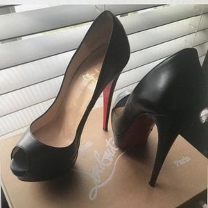 Christian Louboutin Patent leather peep toe pumps
